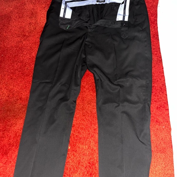 Tommy Hilfiger Men's THFLEX casual pants in khaki. Plus, a pair of TH dress pnts - Picture 5 of 6